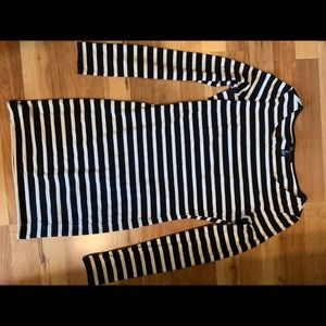 A Black and White Long Sleeve Dress